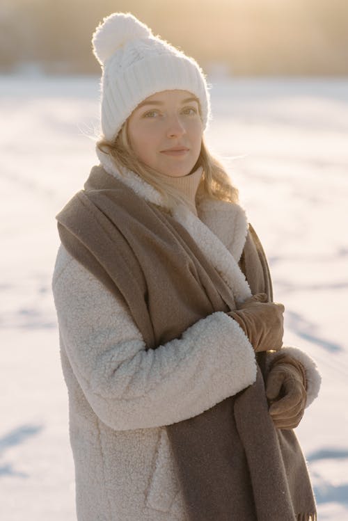 Woman in Fleece Jacket on Snow Covered Ground