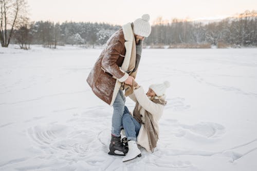 Romantic Couple in Winter Clothes Having Fun on Ski Resort