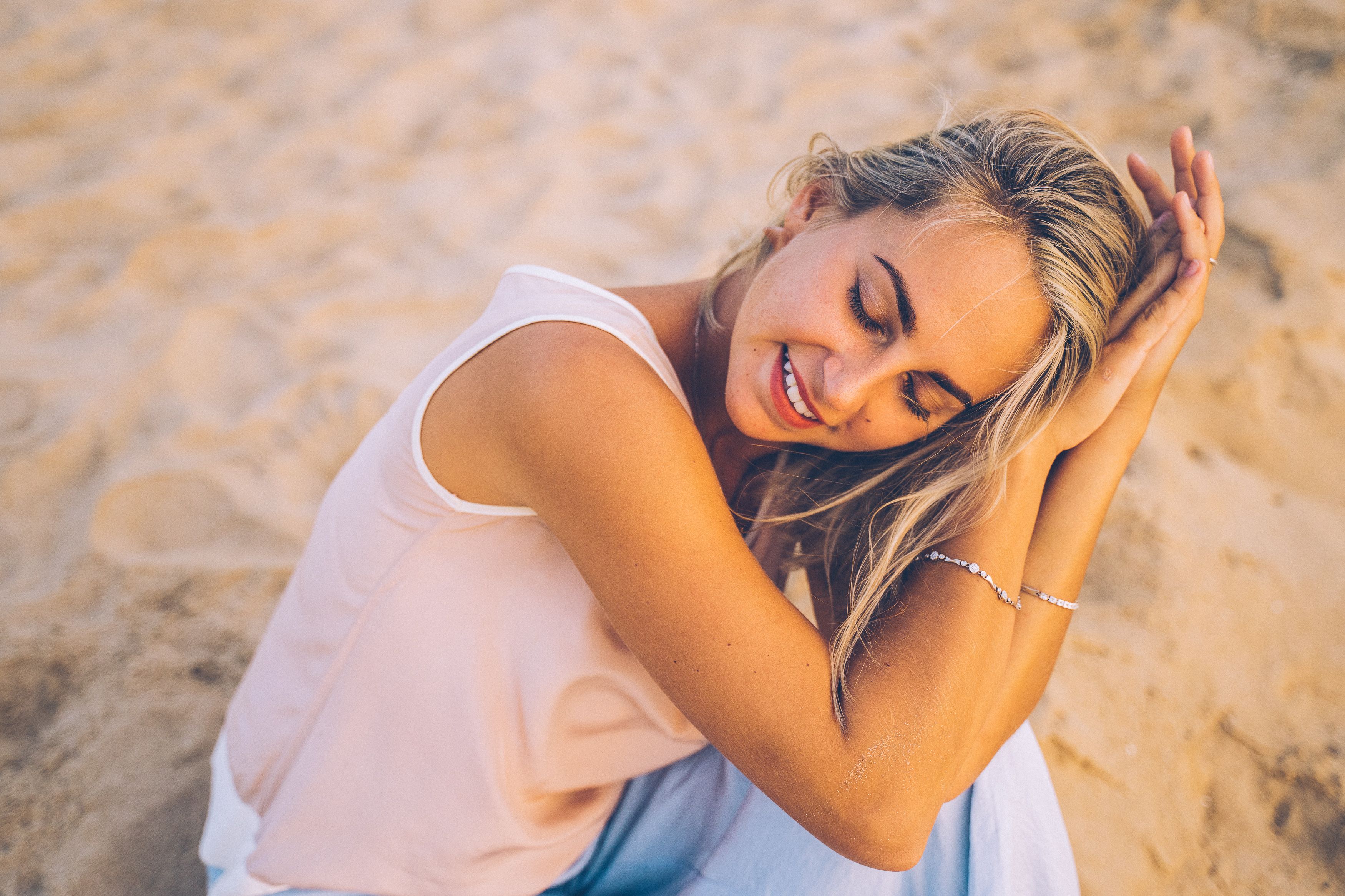 woman relaxing outdoors representing tissue repair and regenerative wellness