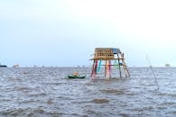 Bungalow on water of clam farm