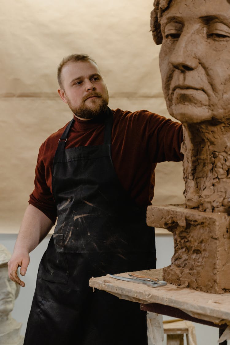 A Sculptor Working 