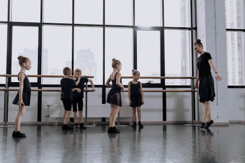 Free A Ballet Dancer Teaching Girls  Stock Photo