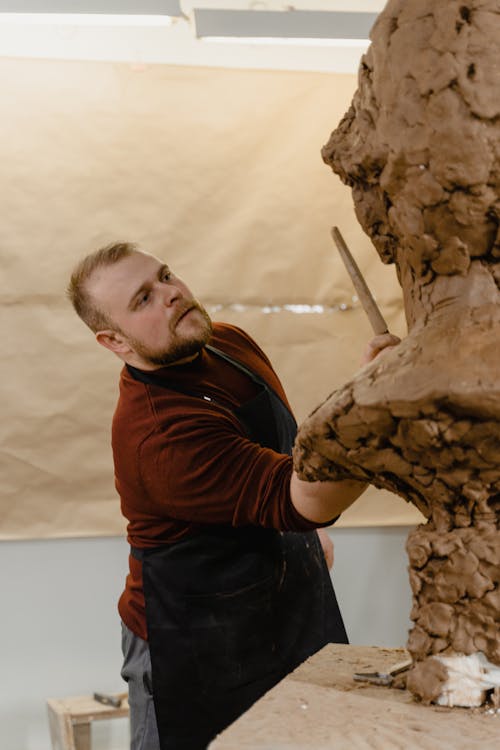 A Sculptor Making a Clay Sculpture