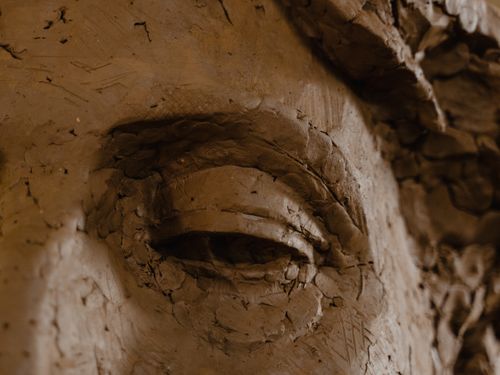 Free Detailed close-up of a handmade clay sculpture showcasing intricate craftsmanship. Stock Photo