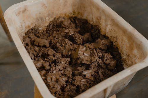 Wet Clay Mud In Plastic Container
