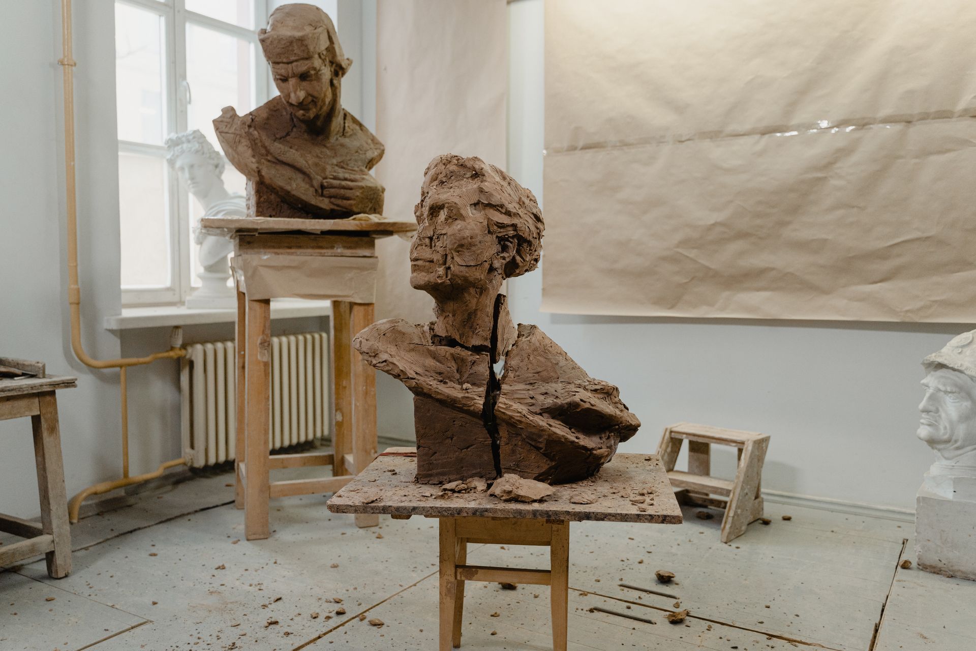 Cracked Sculpture on a Wooden Table