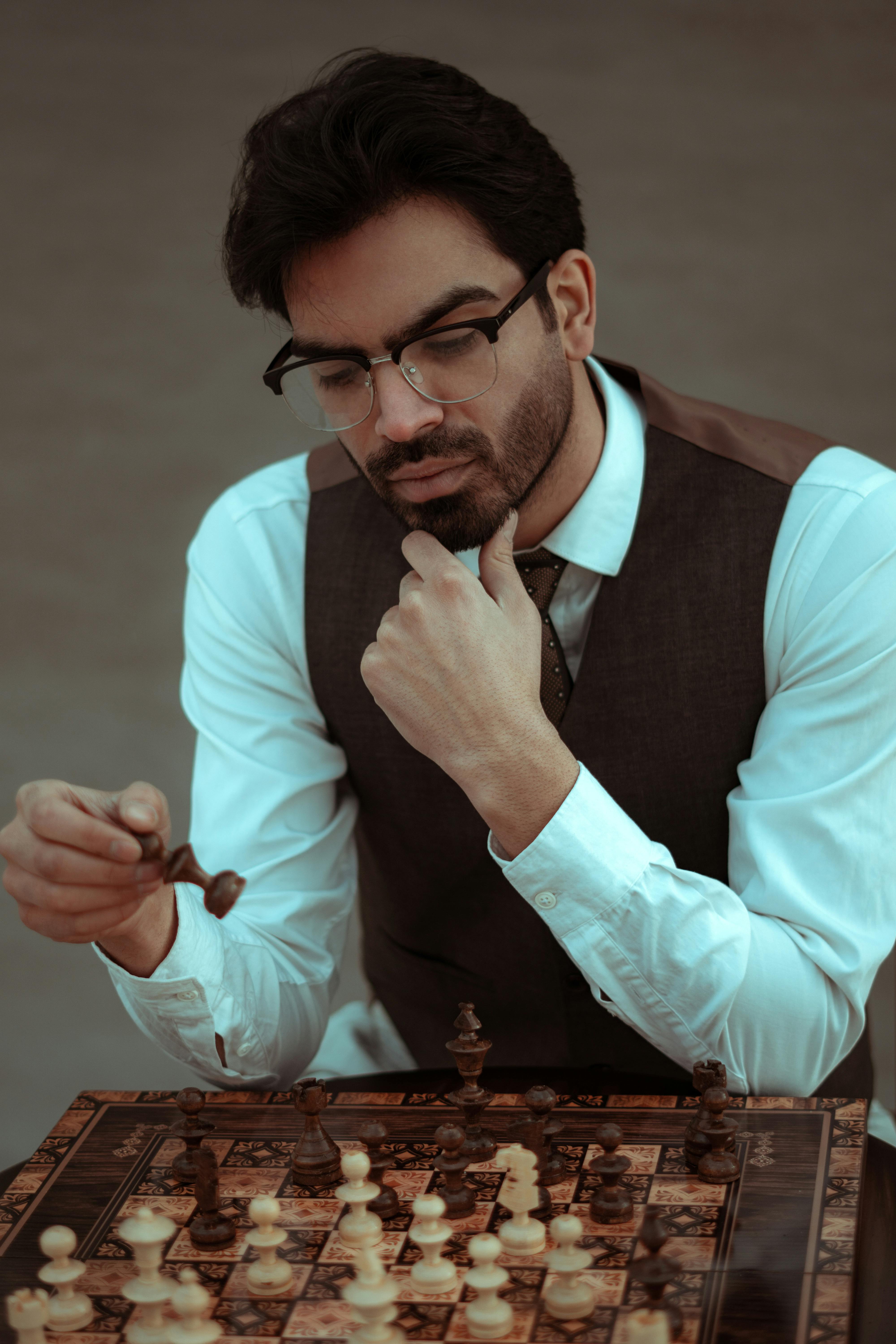 Boy Concentrating on His Next Chess Move Stock Image - Image of  concentration, glass: 295057