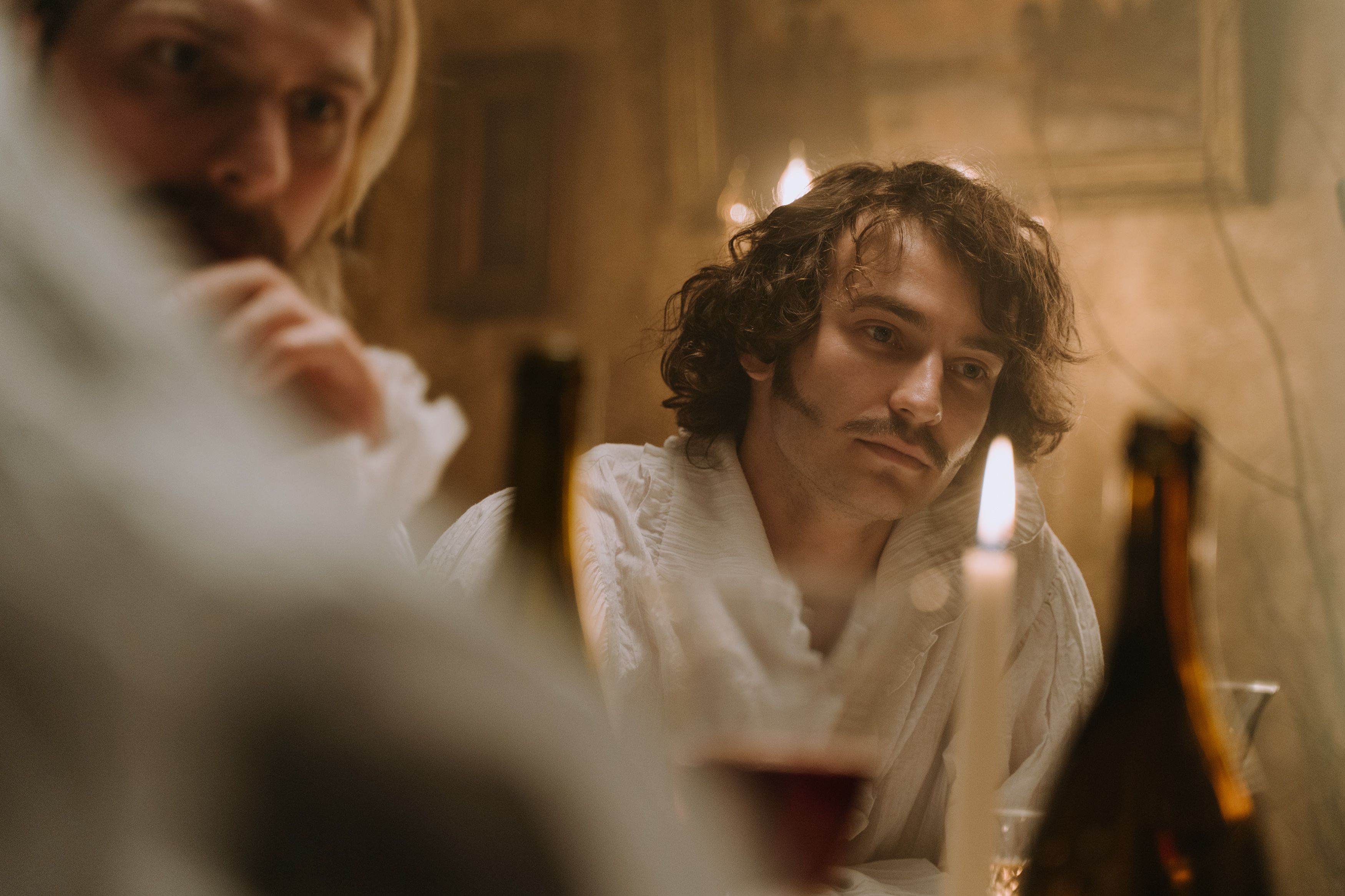 historical coffeehouse scene with men debating politics