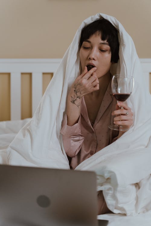 Free Woman Holding Wine Glass Stock Photo