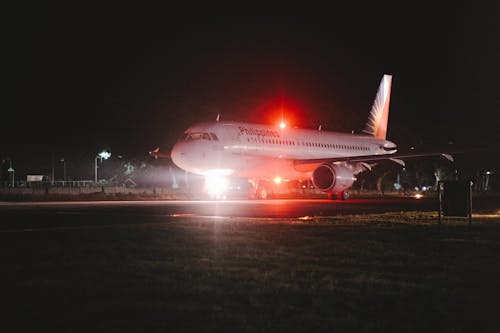 Ücretsiz gece, hava aracı, havaalanı içeren Ücretsiz stok fotoğraf Stok Fotoğraflar