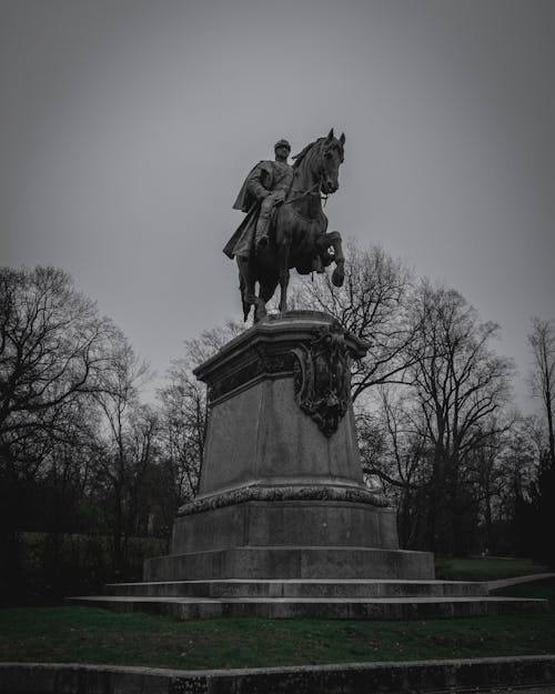 Monument of Man on the Horse in a Park 