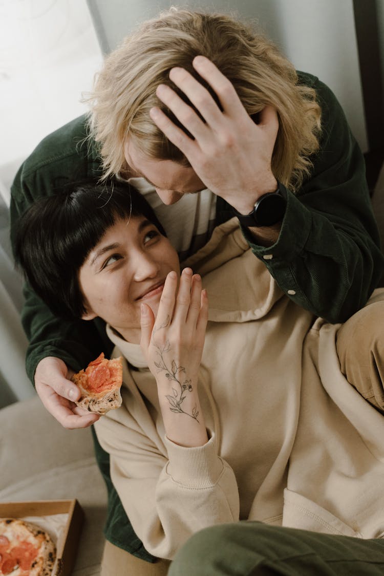 Happy Couple Eating Pizza 