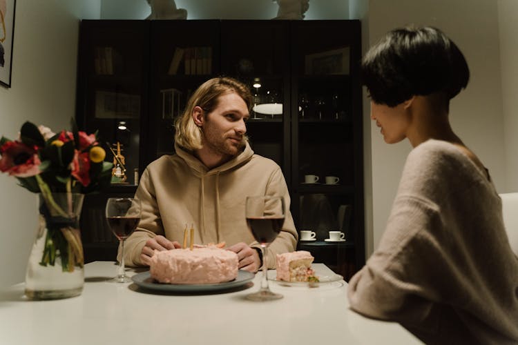 Man And Woman Having Cake