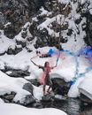 Photo of a Woman Holding Smoke Bombs