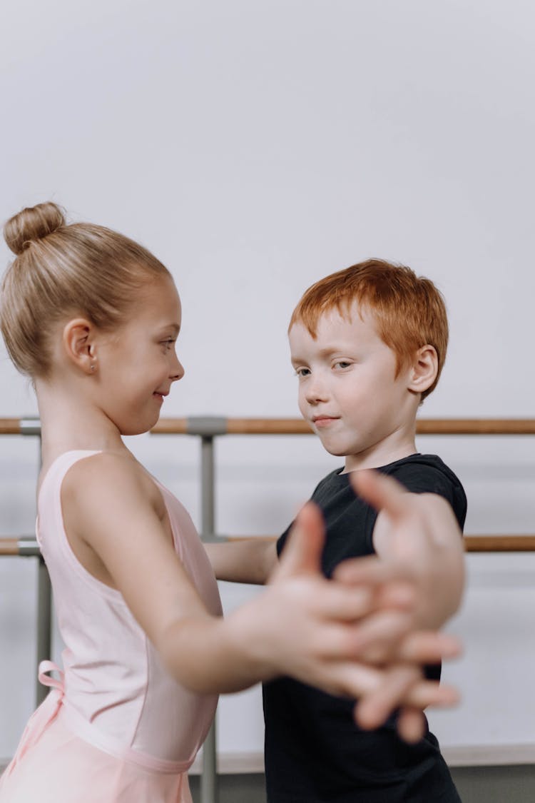 Little Boy And Girl Dancing