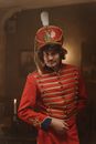 Woman in Red and Gold Costume