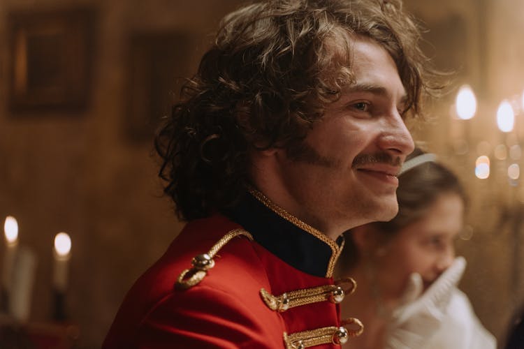 Close Up Photo Of A Man In Scarlet Tunic