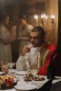 A Man Sitting at the Table