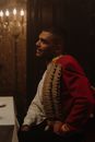 A Man Sitting at the Table