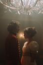 A Couple Standing in the Room