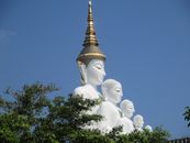 White Concrete Statues Under the Blue Sky