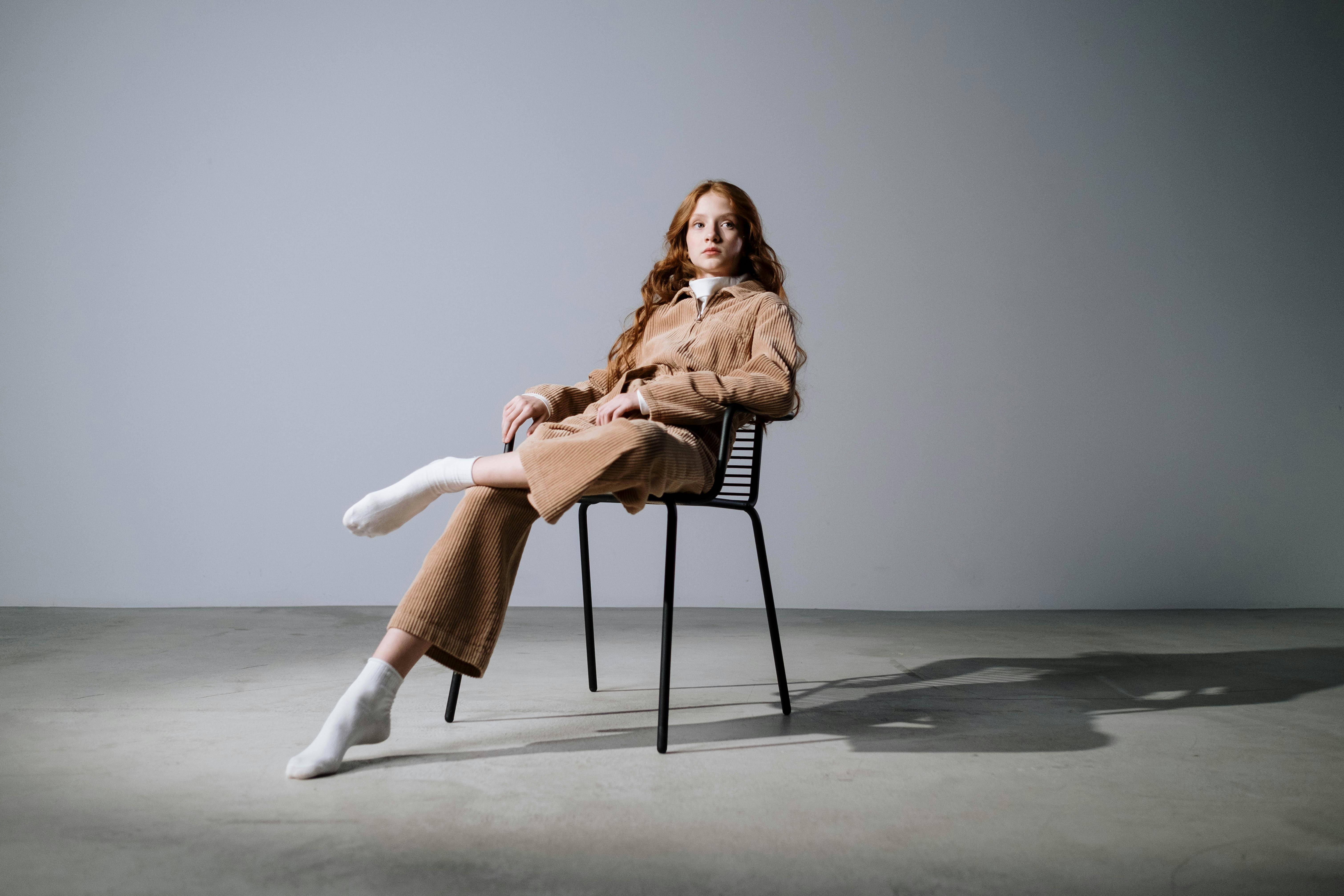 a woman sitting on the chair