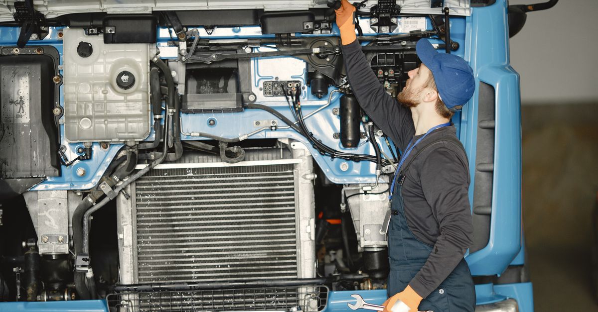 Man Testing Engine A Man Checking the Engine · Free Stock Photo