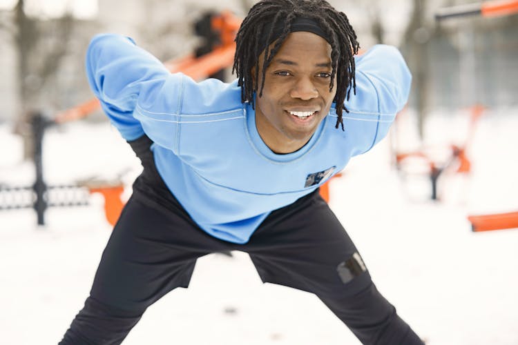 A Smiling Man Leaning Forward 