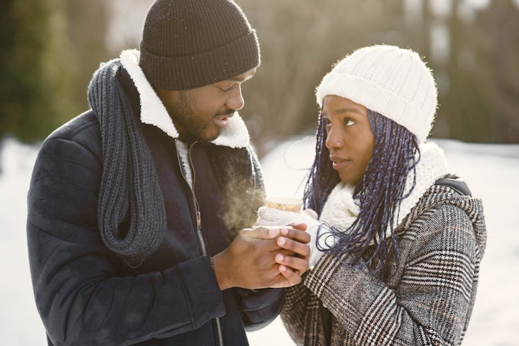 Couple Sharing A Hot Drink