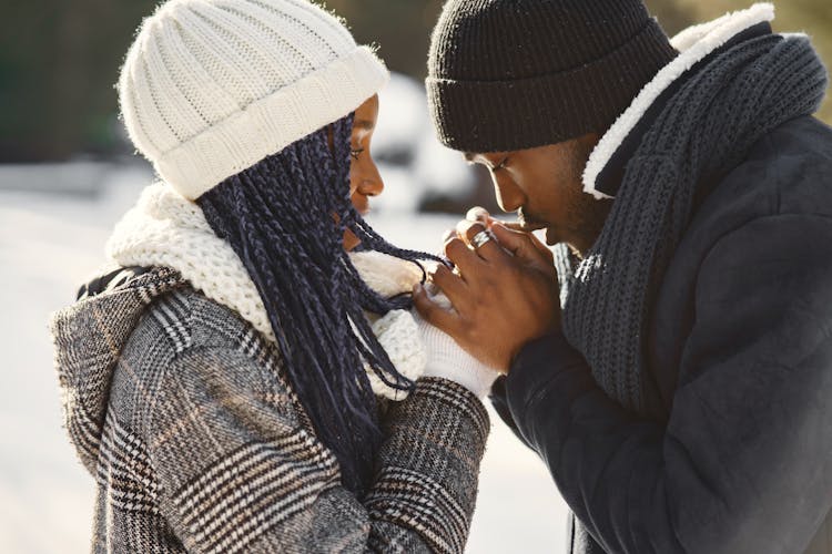 Man Kissing Womans Knuckles