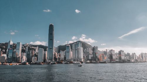 Free Beautiful view of Hong Kong skyline featuring the International Finance Centre and Victoria Harbor. Stock Photo