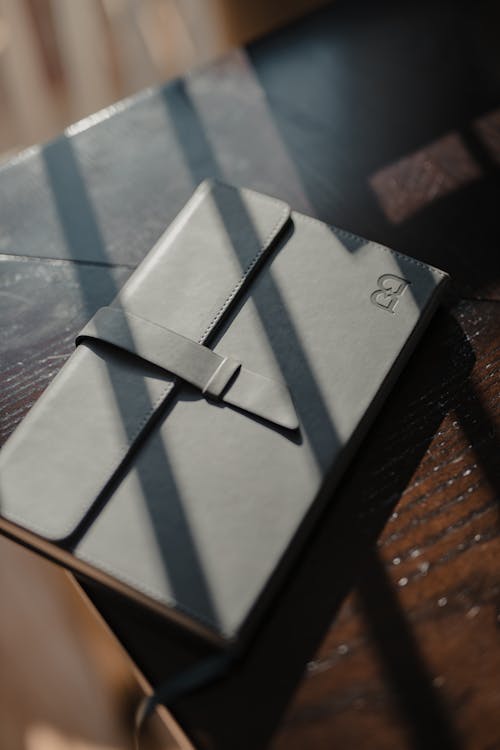 Close-Up Shot of a Leather-Covered Notebook