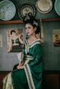 A Pretty Woman in Green Traditional Dress