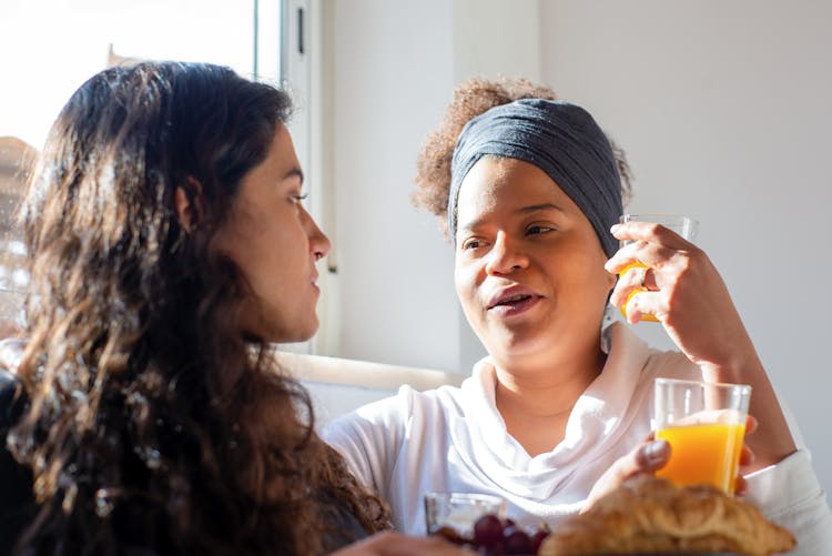 Women Drinking Orange Juice