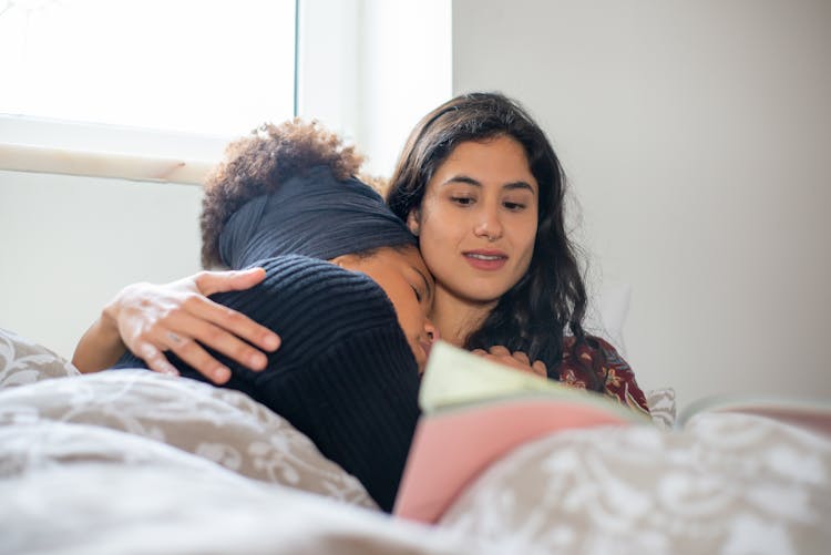 A Woman Sleeping With Her Partner 