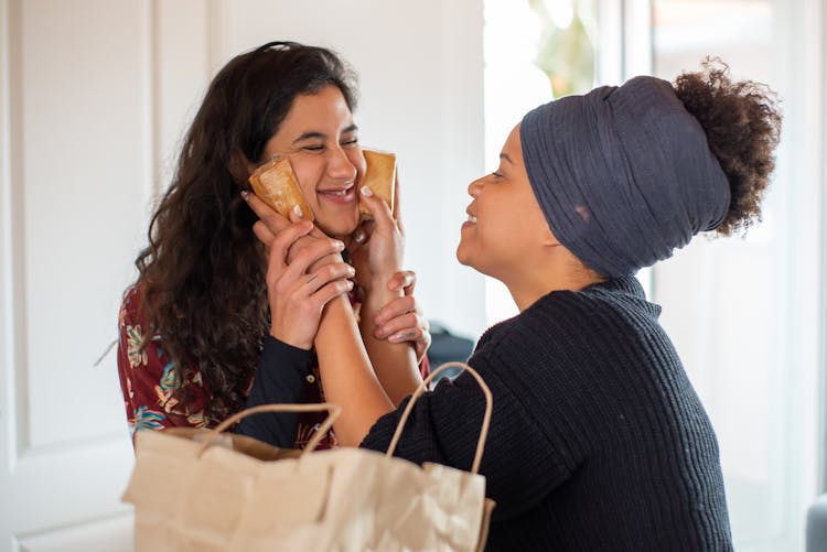 Two Women Laughing Together 