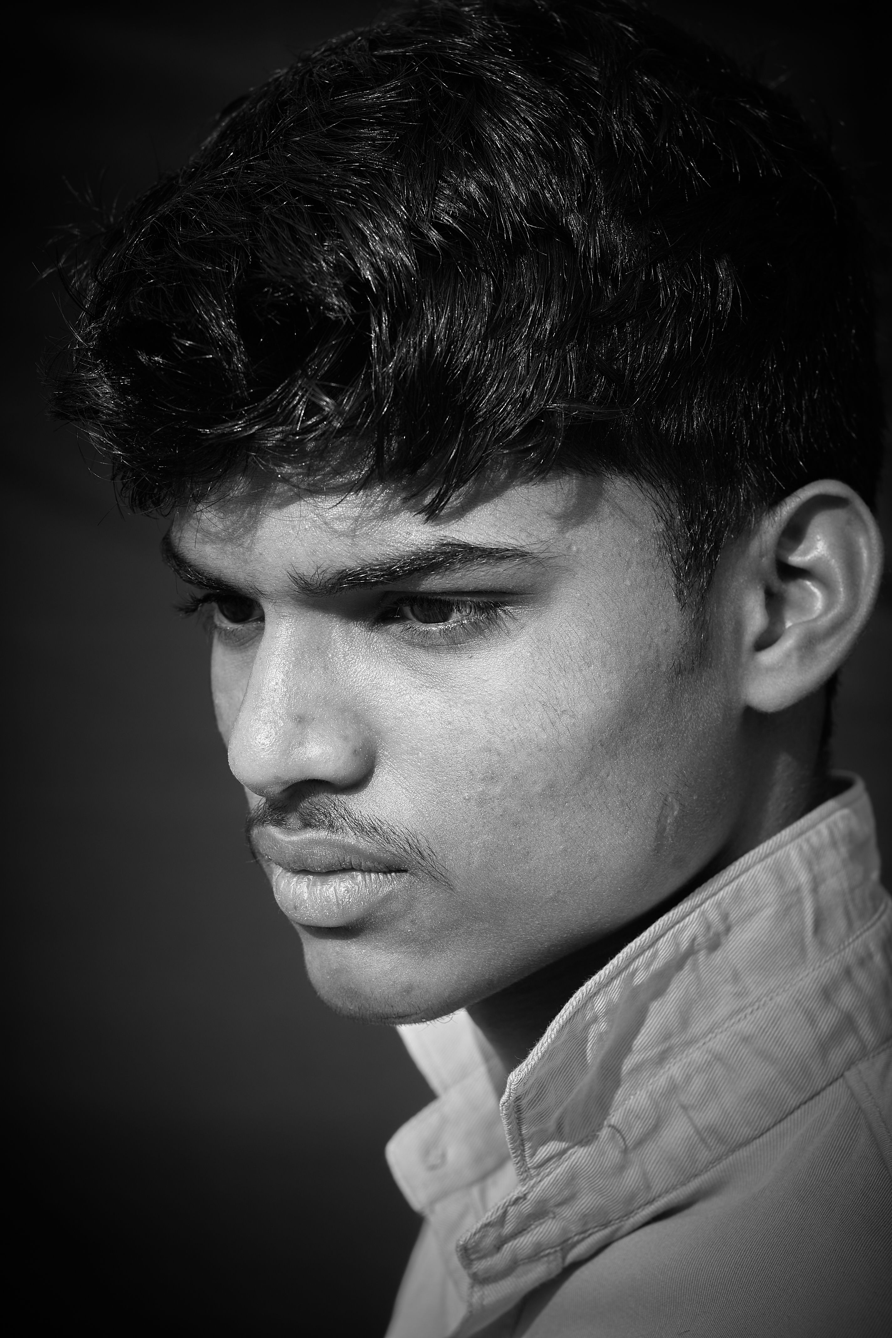 Grayscale Photo of a Man Looking at Camera · Free Stock Photo