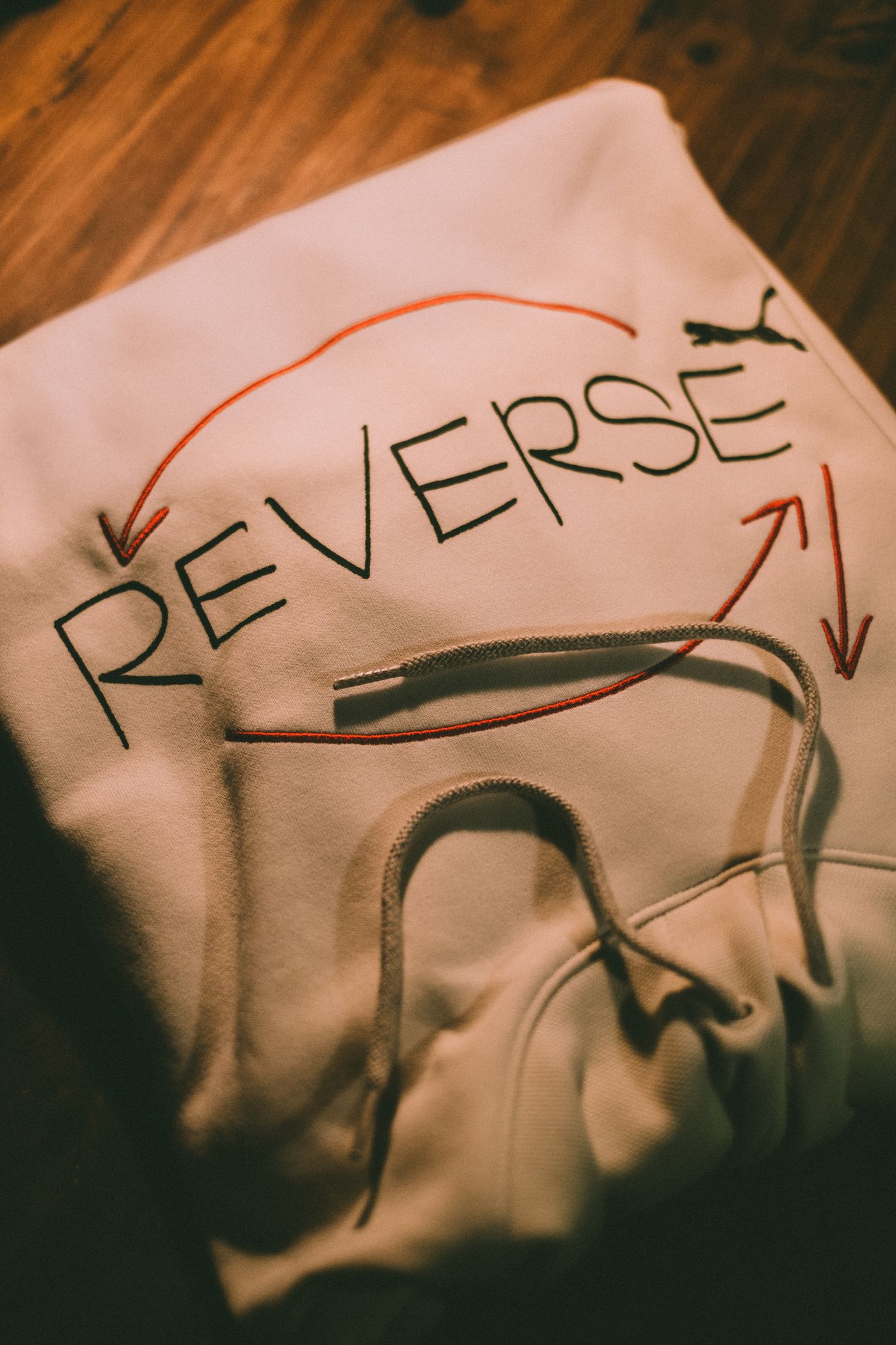 Folded sweatshirt showing printed artwork