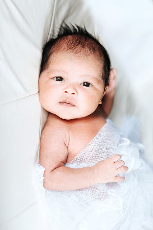 Free Close-Up Shot of a Baby Stock Photo