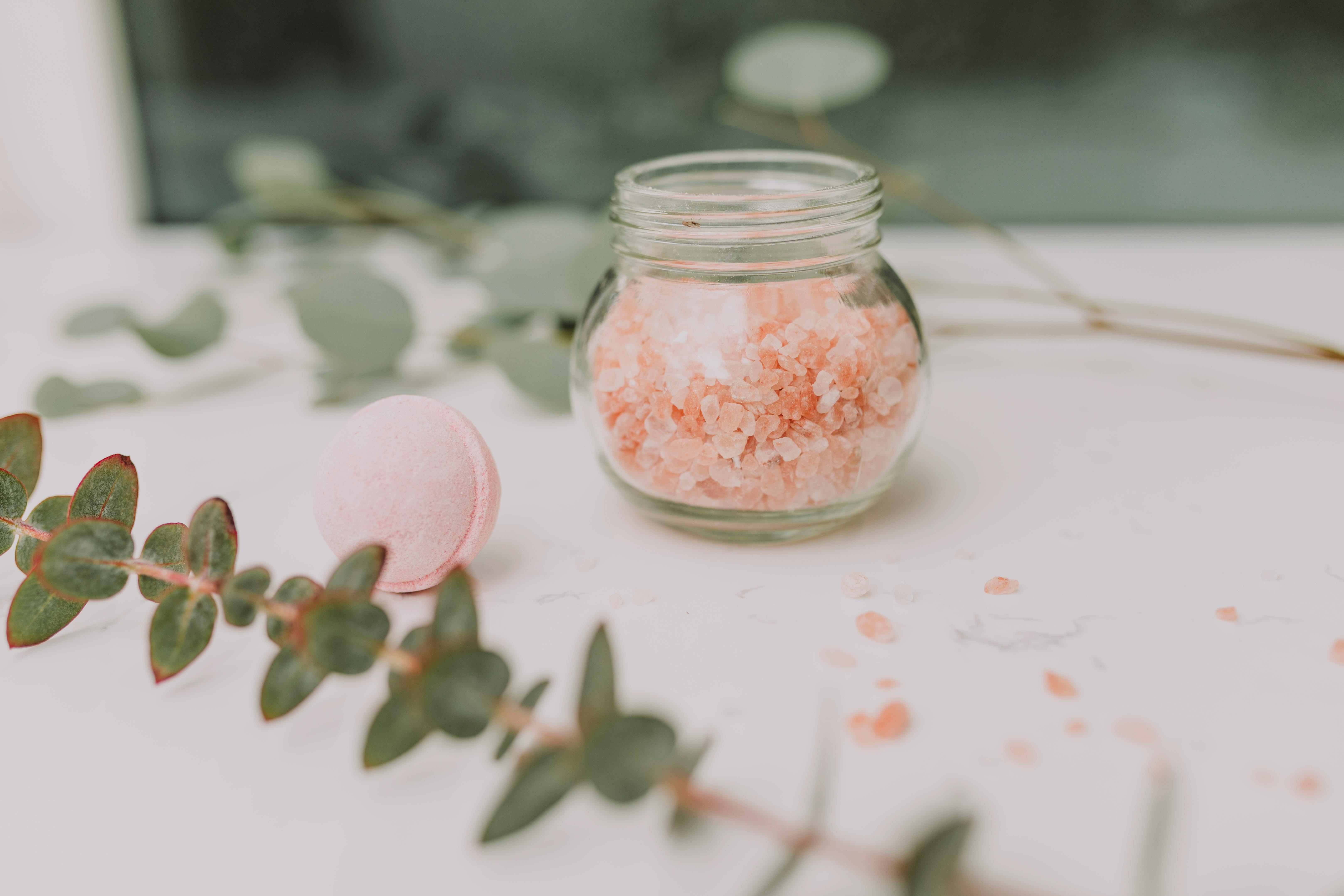 clear glass jar with white powder inside