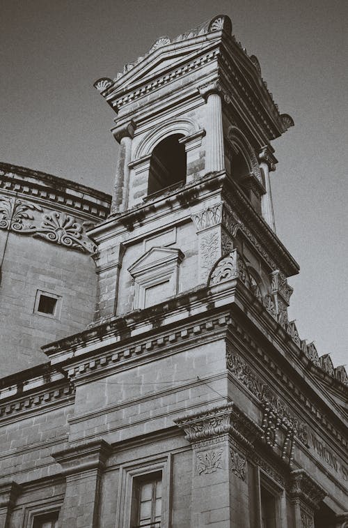 Grayscale Photo of a Concrete Building