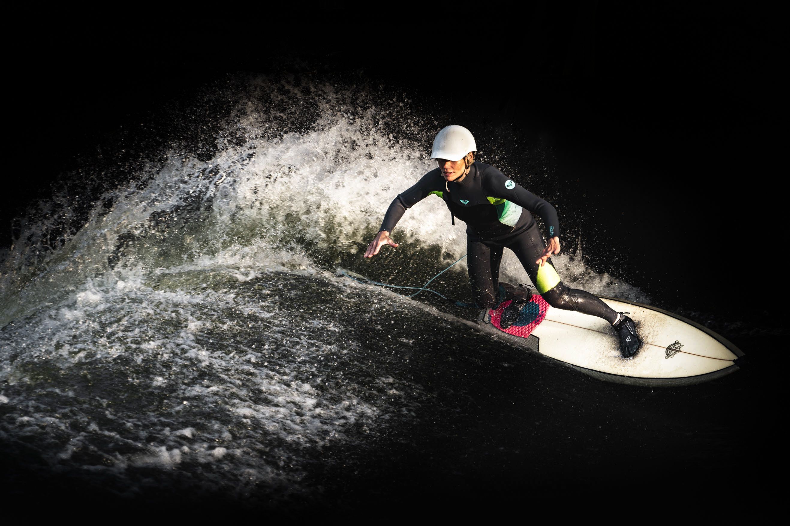 An enthusiastic surfer on a wave in Slovakia, showcasing skill and excitement.