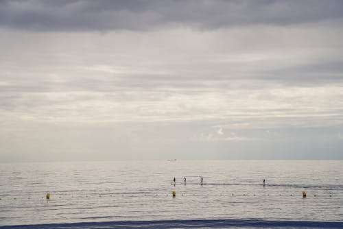 Fotos de stock gratuitas de gente, mar, nubes