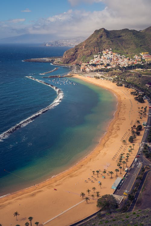 Free Aerial View of a Beach Near a Mountain Stock Photo