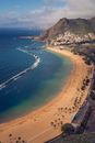 Aerial View of a Beach Near a Mountain