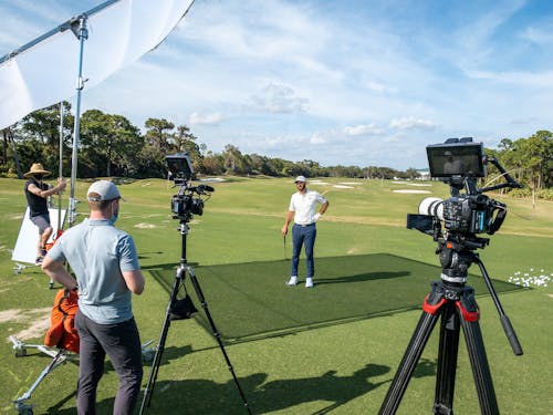 Free Golfer Surrounded by Camera Crew Stock Photo