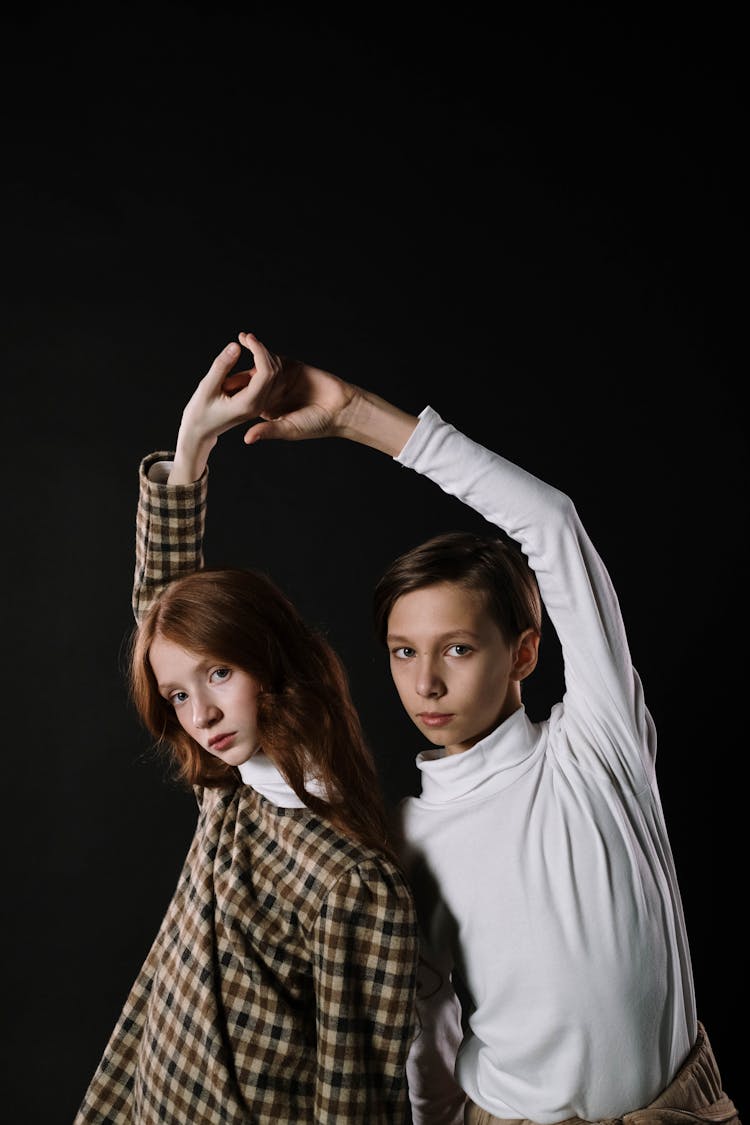 A Girl And Boy Dancing Together 