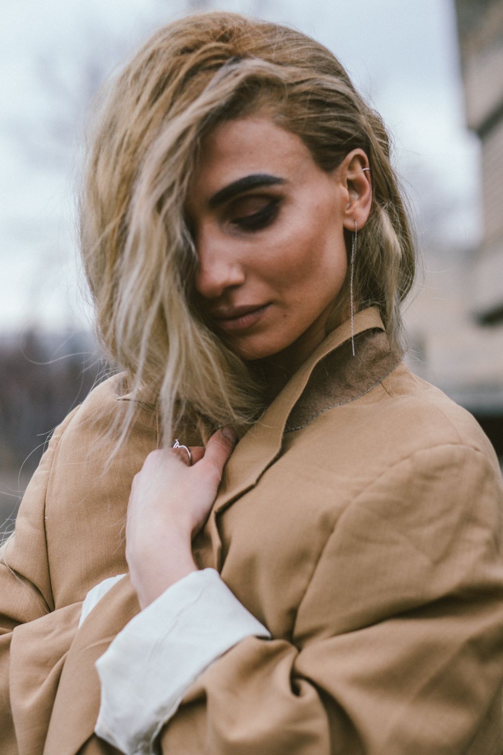 A Woman Wearing Brown Coat · Free Stock Photo