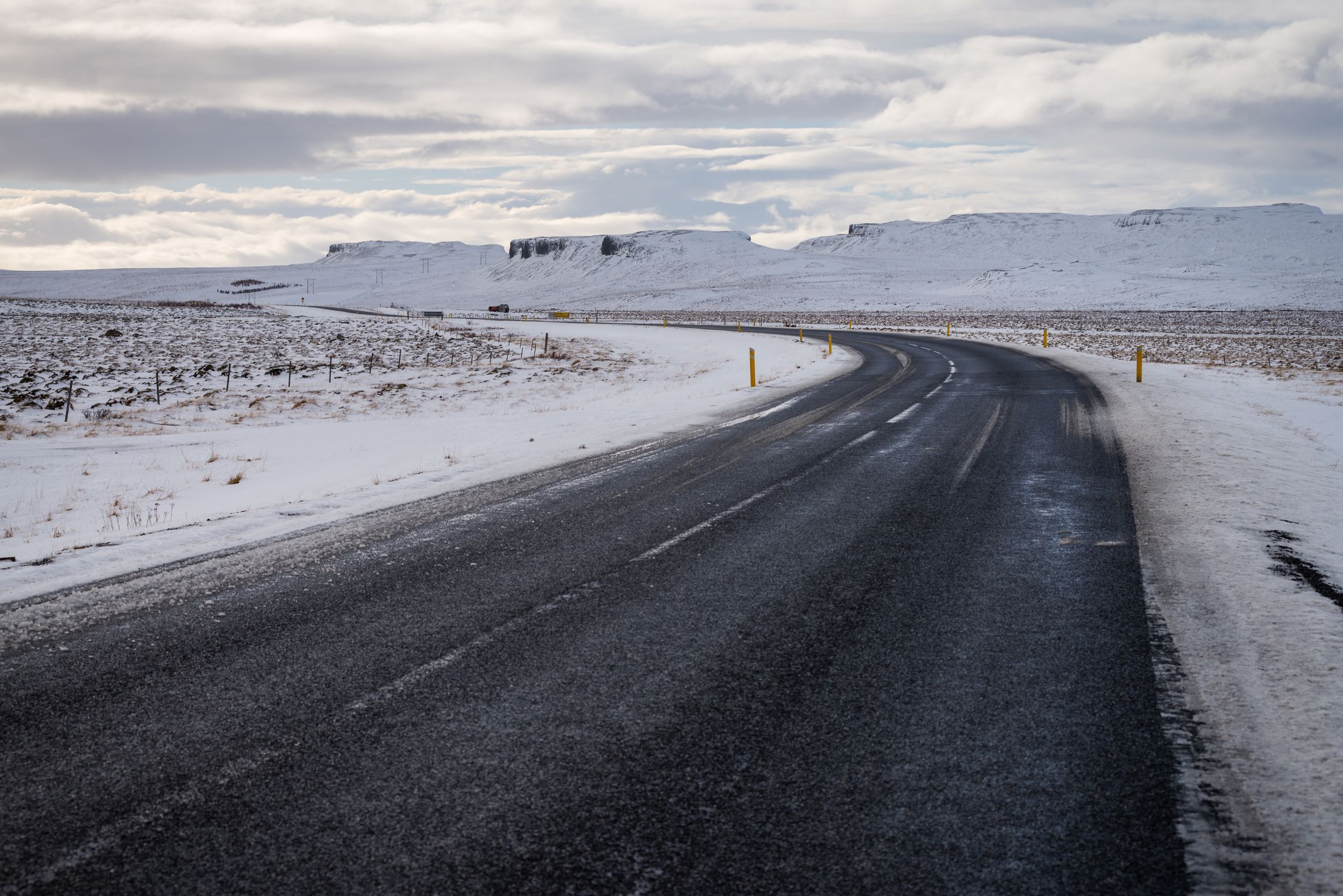 Gray Asphalt Road Between Snow Covered Land · Free Stock Photo