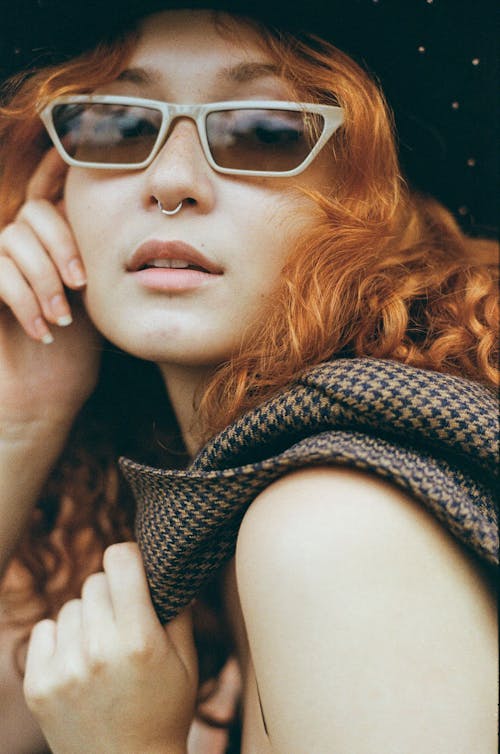 Free Stylish redhead woman in hat Stock Photo